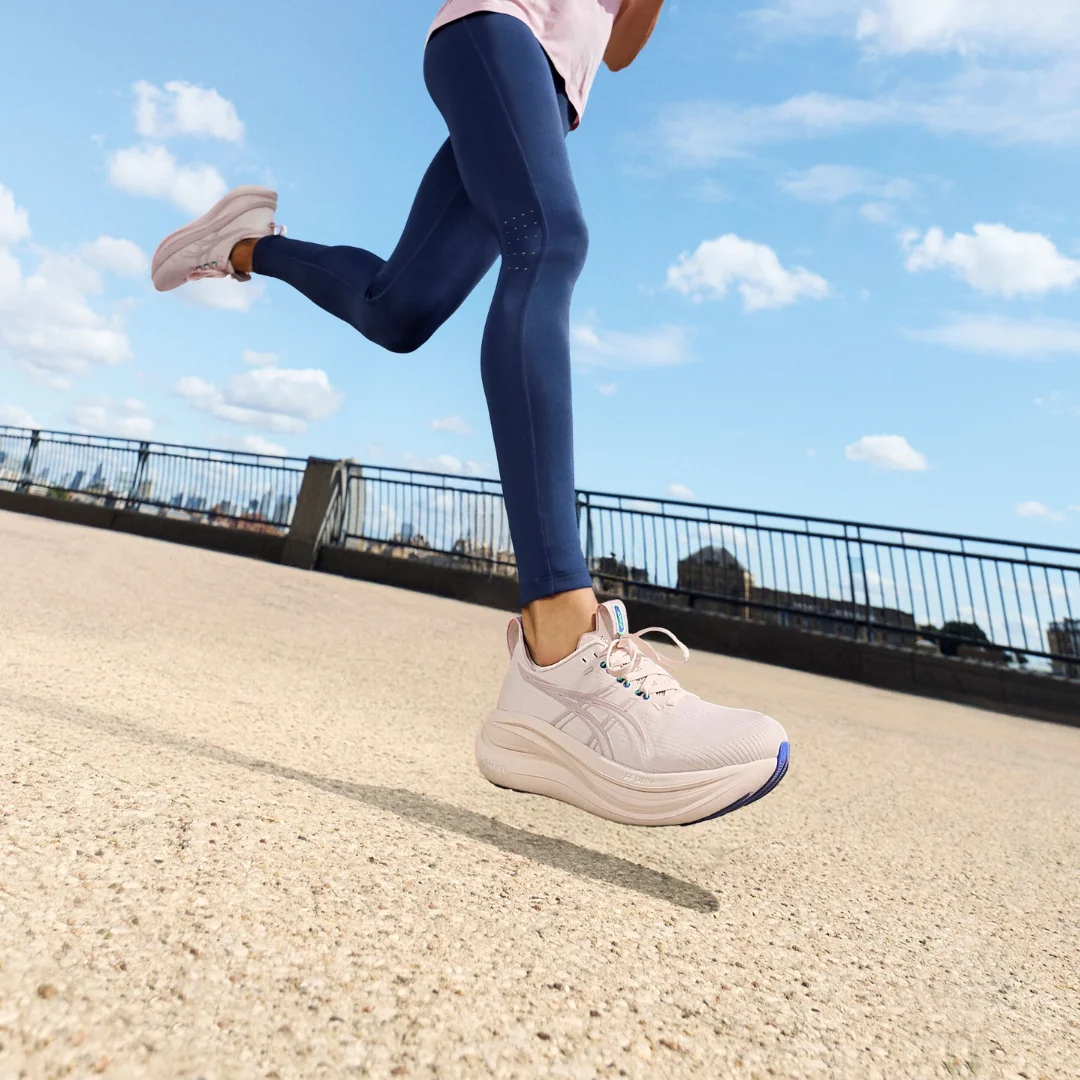 person running with trainers