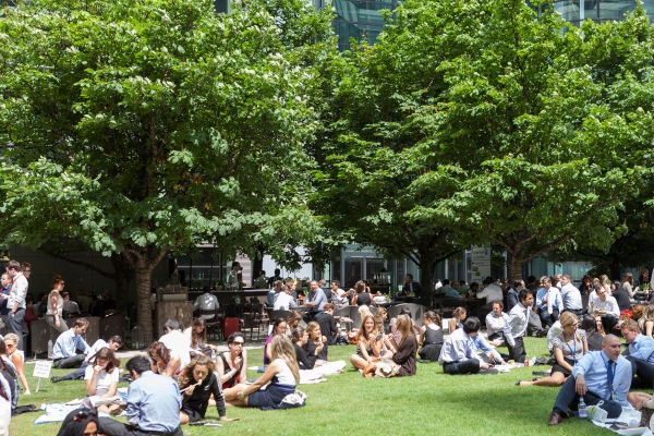 Sitting on the grass in Canada Square Park