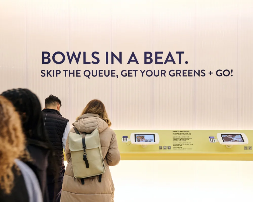 people queuing at a takeaway