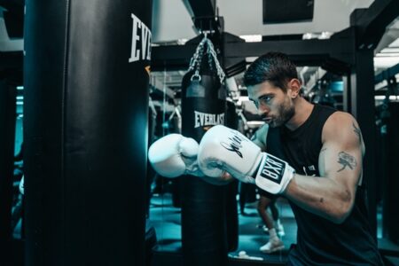 Man boxing at Sweat by BXR