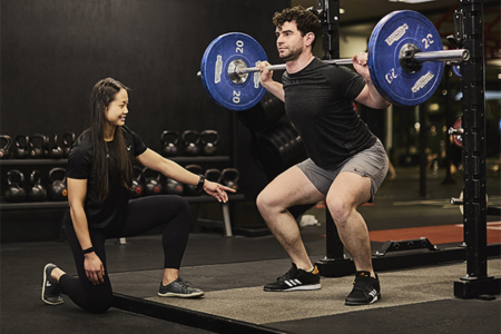 Man lifting weights at Third Space