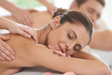 Woman looking relaxed and receiving a massage 