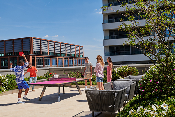 People playing table tennis at 8 Water Street