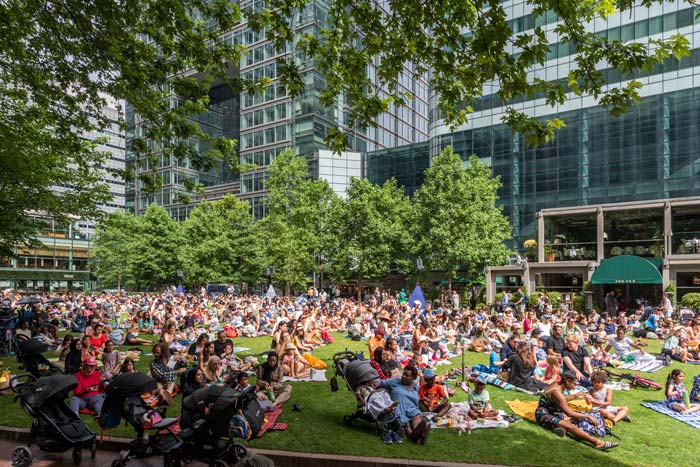 Crowd of people out in Canada Square Park