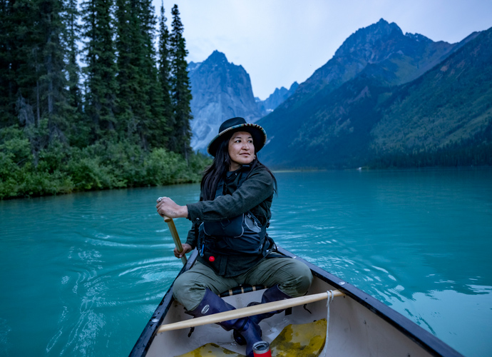 Teetl’it Gwich’in guide and activist Bobbi Rose glides across Glacier Lake in the remote Northwest Territories of Canada.