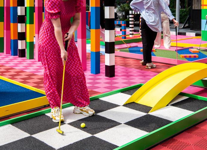 playing mini-golf in canary wharf