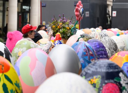 A man amongst the egg sculptures