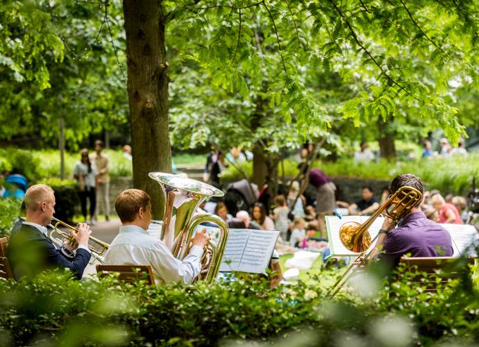 A classical band performing out in the open park