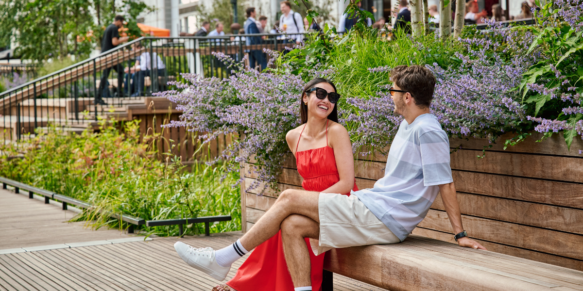 Couple sitting and talking by nature