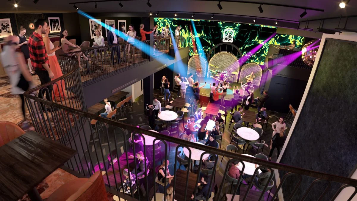 Photo from balcony with people eating and strobe lights