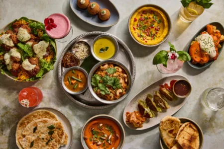 Plates of food with drinks