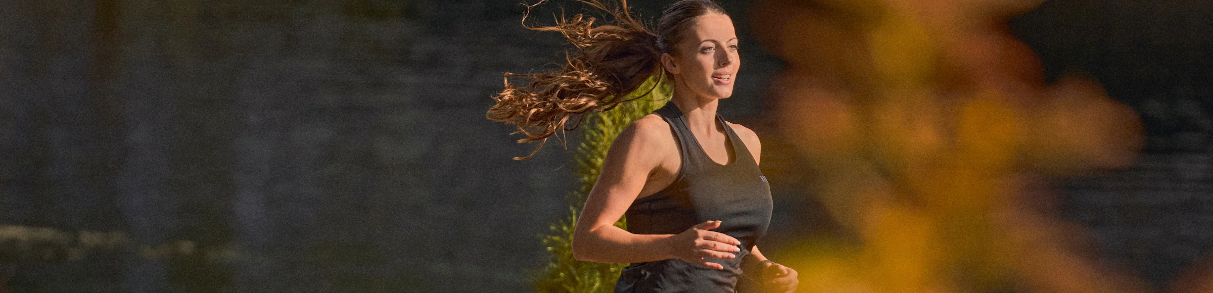 girl running with hair blowing behind