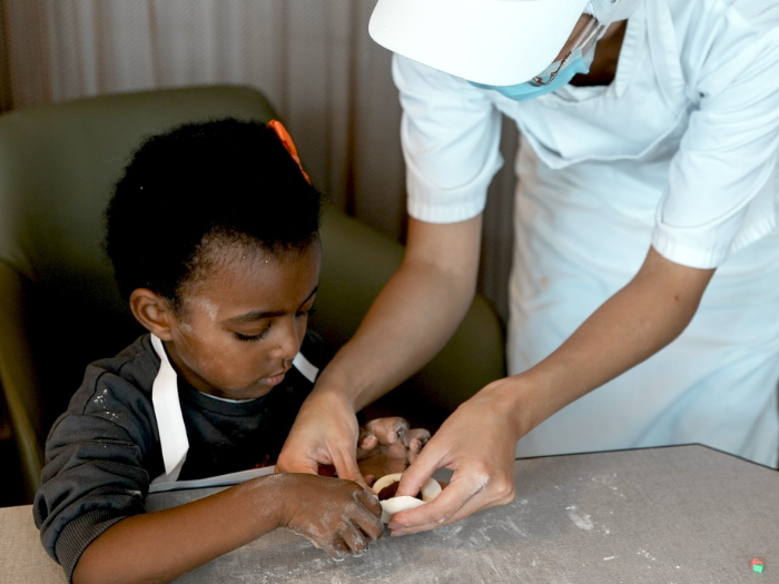 Child Making Dumplings