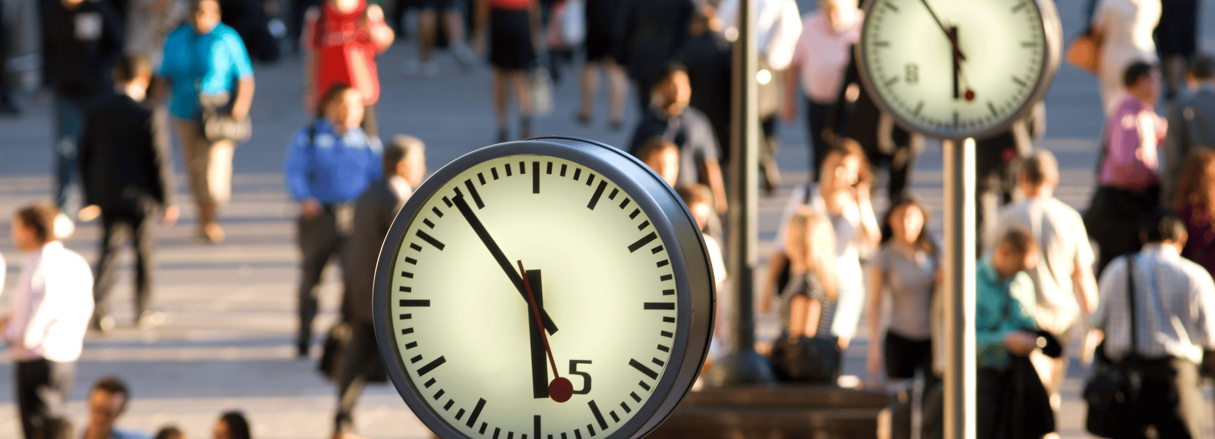 clocks and people walking