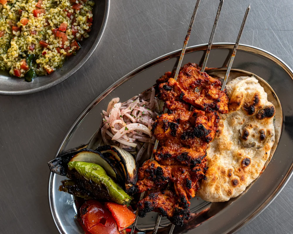 chicken on skewer and cous cous