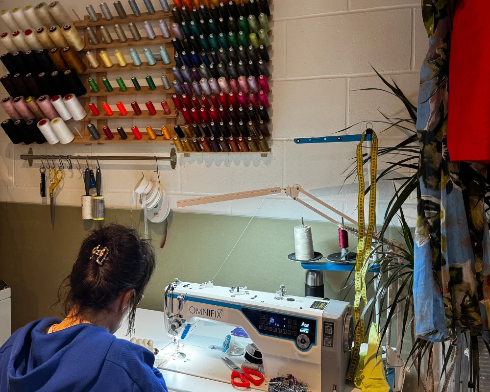 Women on a sewing machine