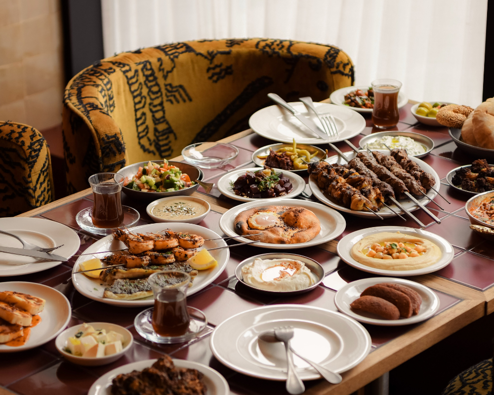 table with plates of food