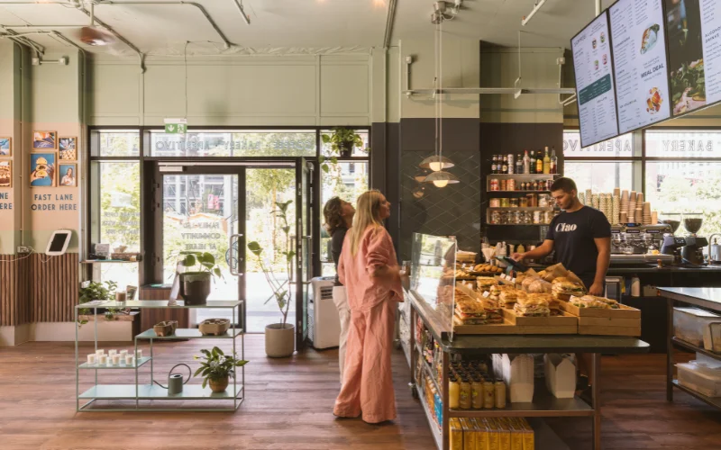 People ordering in a cafe